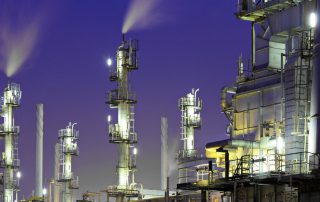 Oil refinery plant at night