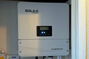 One of our PowerBanx SolaX inverters installed in a hall cupboard (Image: Tanjent)