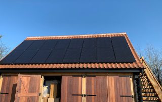 Solar panels installed on the garage roof for Mr RM, Colchester (CO6), Essex