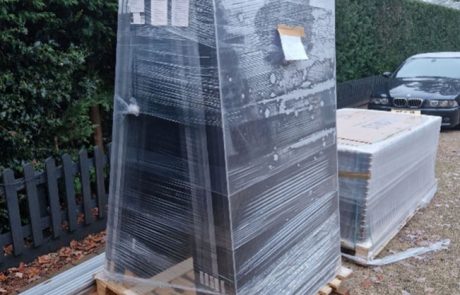 Solar panels stacked on a pallet (Image: Tanjent)